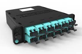 Professional technician in hard hat installing access control card reader at commercial facility