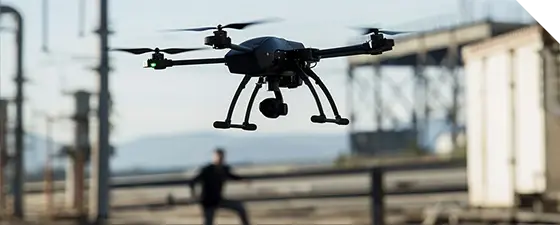 Drone with aerial coverage connecting to multiple buildings in cityscape