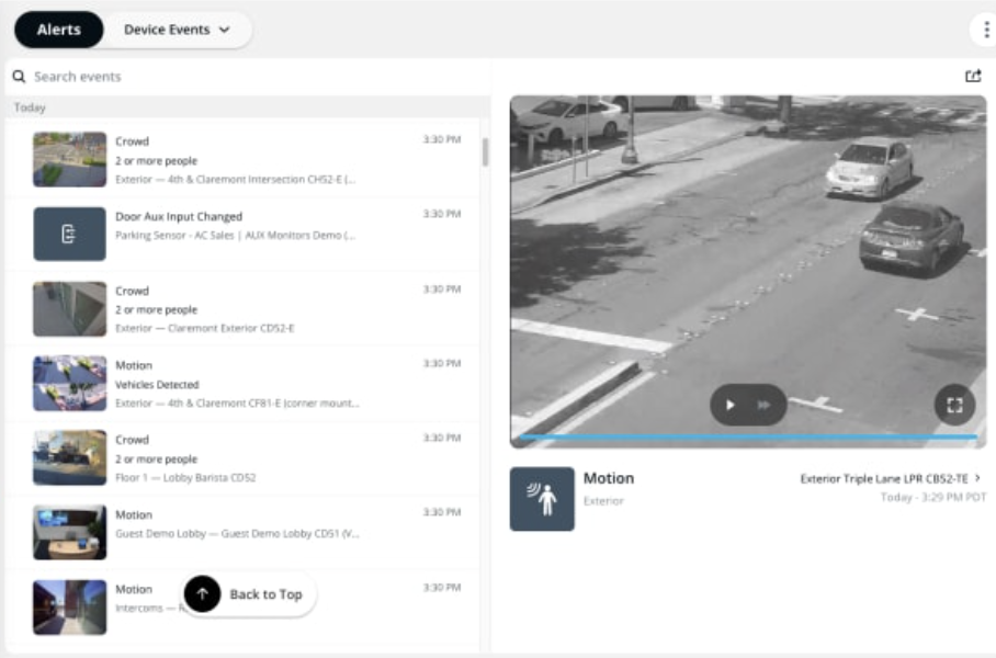 VMS alerts dashboard showing motion detection and live parking lot camera feed