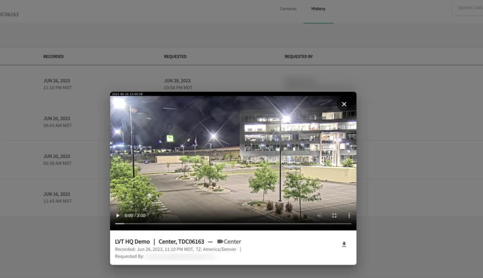 VMS video history interface showing recorded parking lot surveillance footage with playback controls